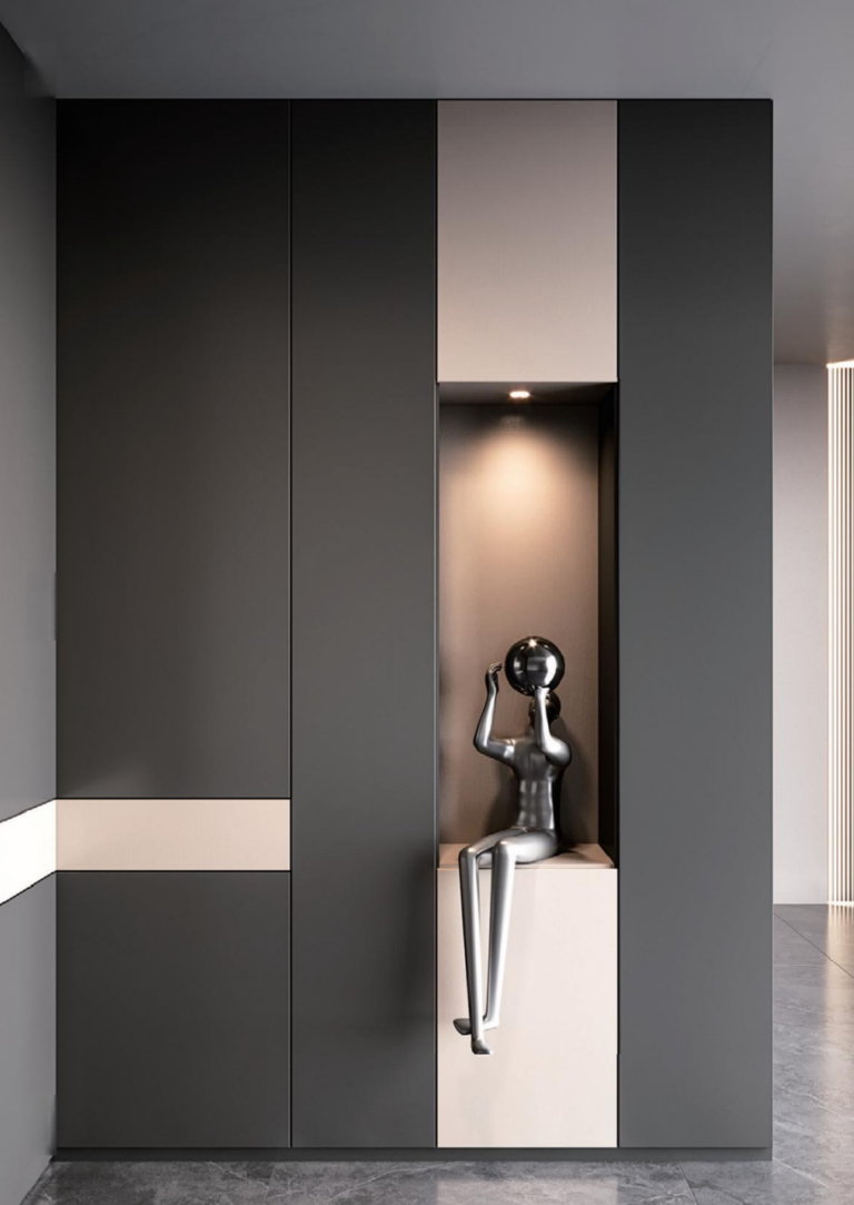 Display niche lit from above with a focused accent beam on a sculpture